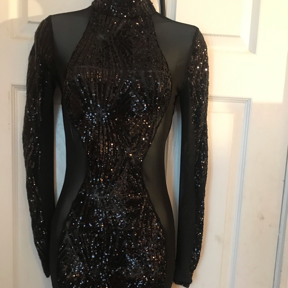 Black sequin sheer dress with Back out.